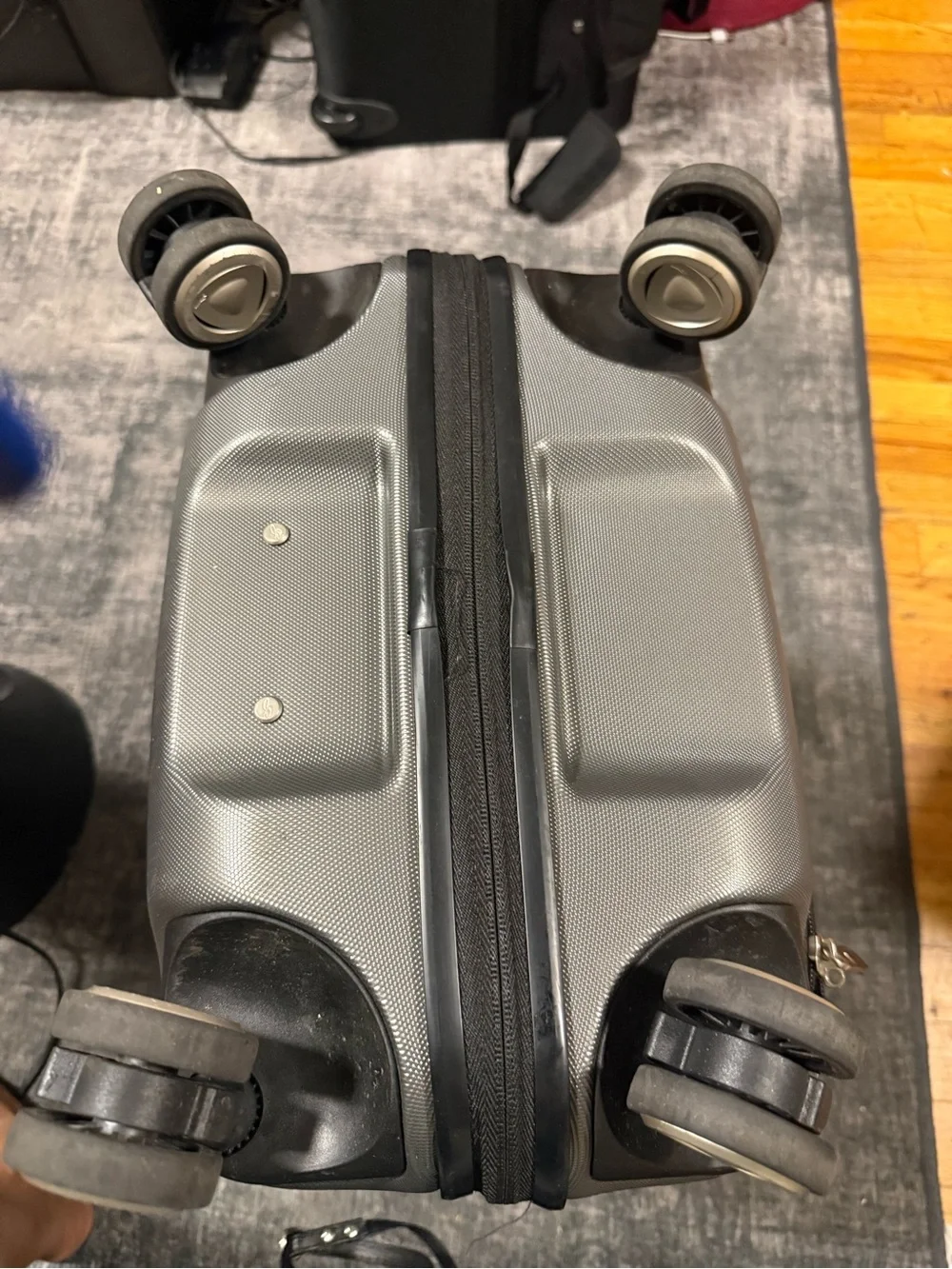 Unixes Gray Hard-Shell Spinner Carry-On Luggage from Macy’s wads $160